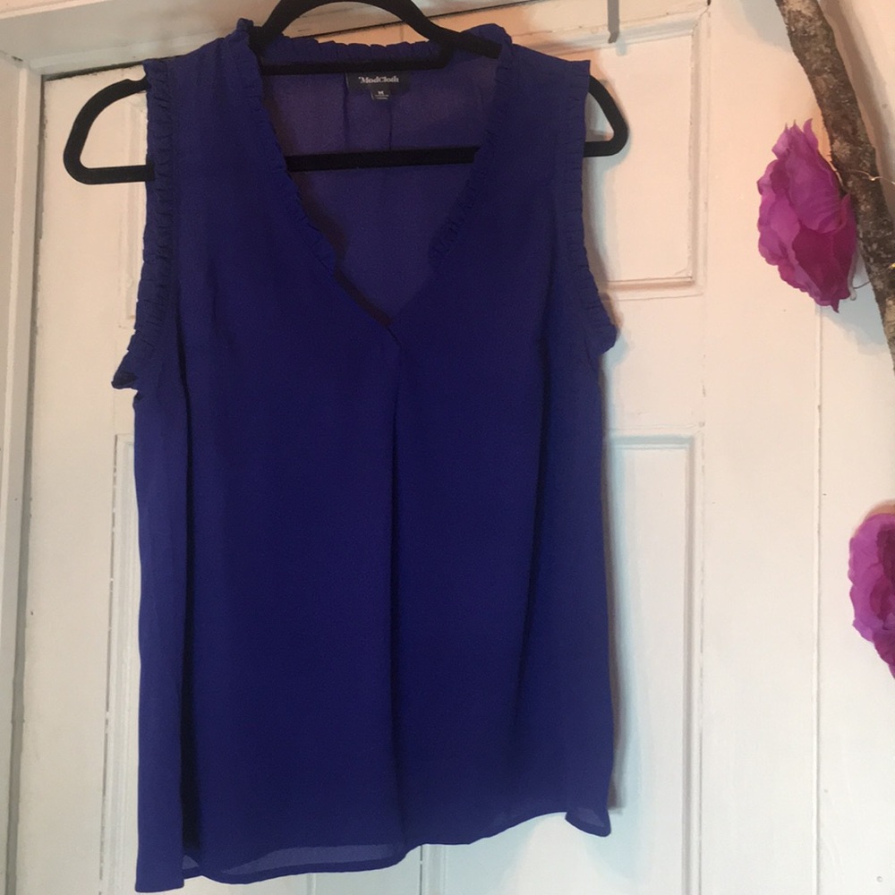 Modcloth V Neck Sleeve Blue Blouse with a  frill trim .